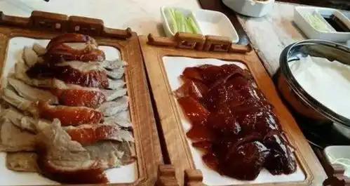  开遍全国各地的北京烤鸭店,为啥打不开广东市场听听老广怎么说