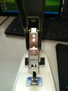  得力0394大订书机怎么维修图中那个铁片不知怎么就这样了