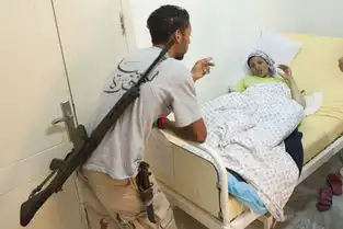  组图卡扎菲的专属美女狙击手被捉后受到了哪些羞辱结局怎样